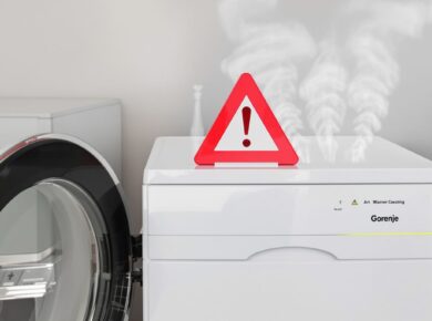 Gorenje Wäschetrockner mit Rauch und rotem Warnsymbol