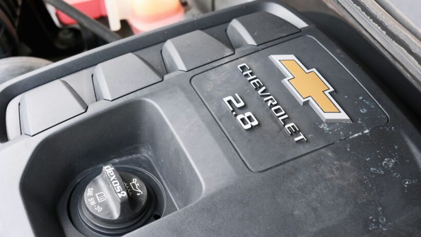 A chevrolet 2.8 engine cover.